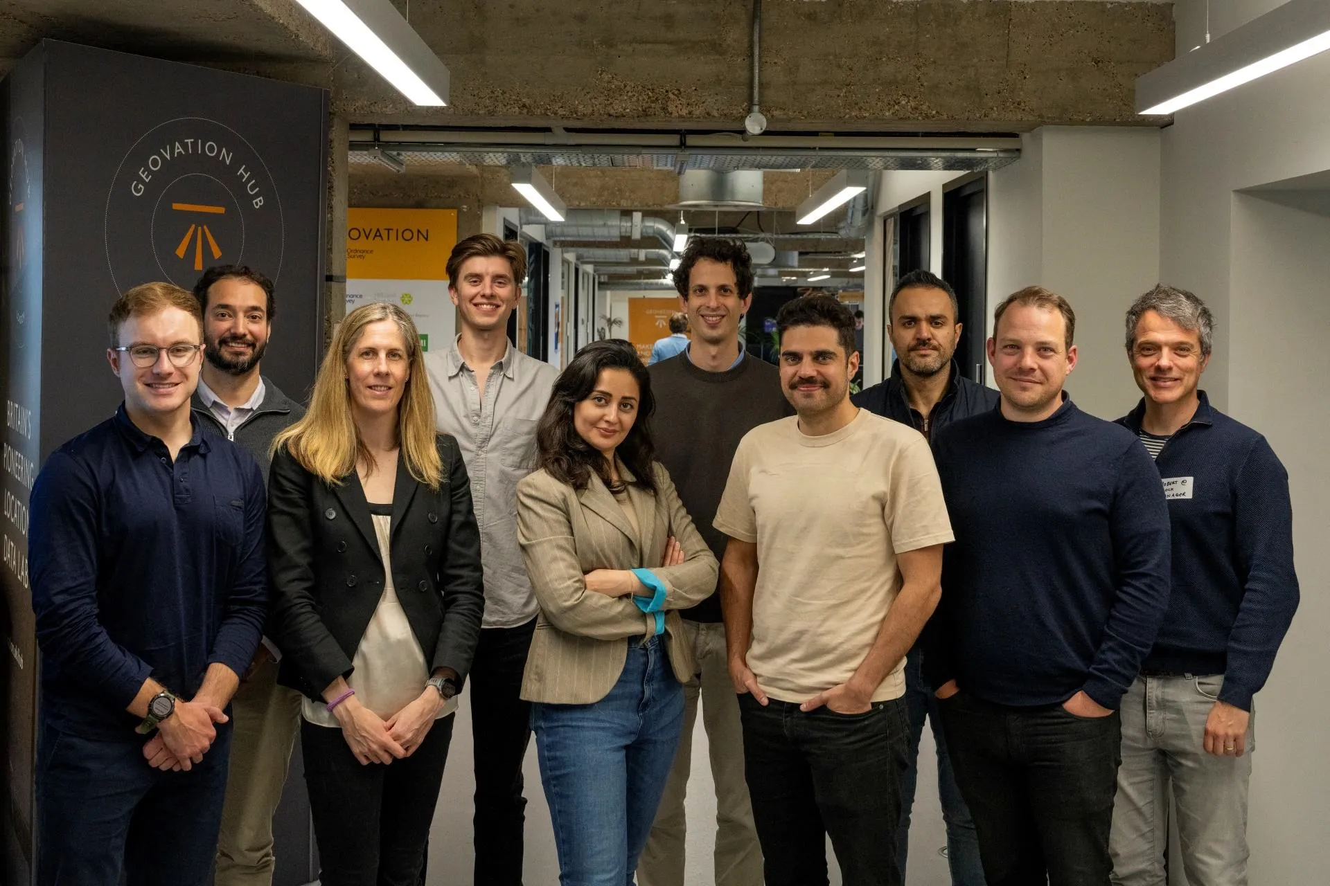 A image of a concrete sphere, balanced between two other larger spheres